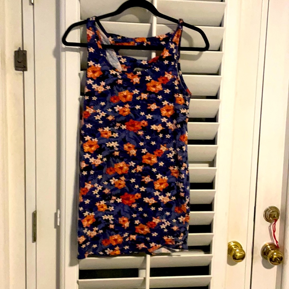 Blue floral dress! Stunning and to your body. Perfect for traveling light